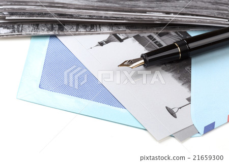 Vintage airmail envelope and fountain pen 21659300