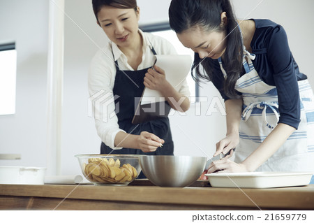 Woman cooking 21659779