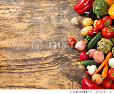 Fresh vegetables on wooden background. Fresh vegetables on wooden background. 21661295