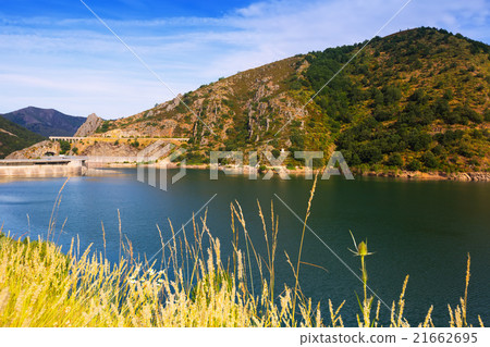 Summer landscape with lake. Barrios de Luna reservoir with dam Summer landscape with lake. Barrios de Luna reservoir with dam 21662695