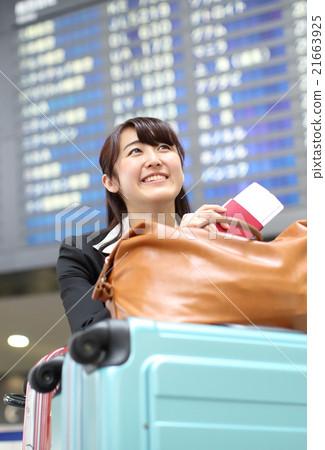 Business woman carrying lots of luggage 21663925