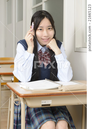 Girls high school studying with a smile Girls high school studying with a smile 21665123
