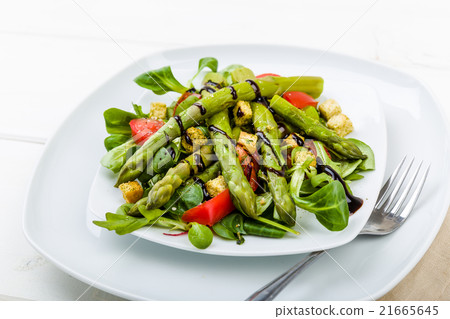 Asparagus salad with balsamic vinegar and tomatoes Asparagus salad with balsamic vinegar and tomatoes 21665645