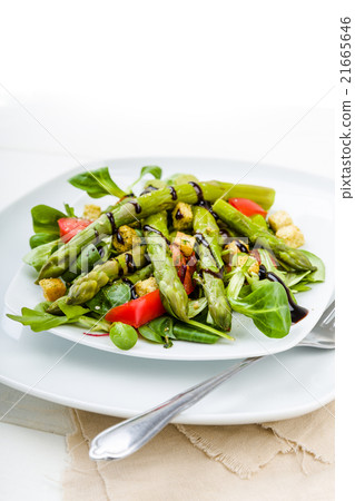 Asparagus salad with balsamic vinegar and tomatoes 21665646
