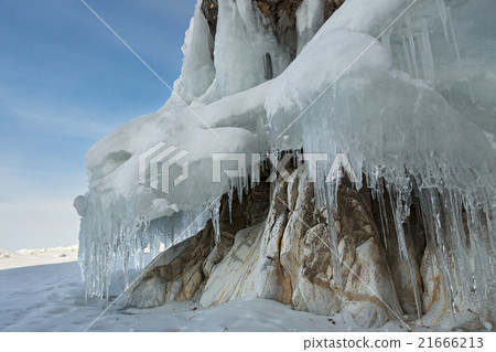 Beautiful icicles on rocks. Beautiful icicles on rocks. 21666213