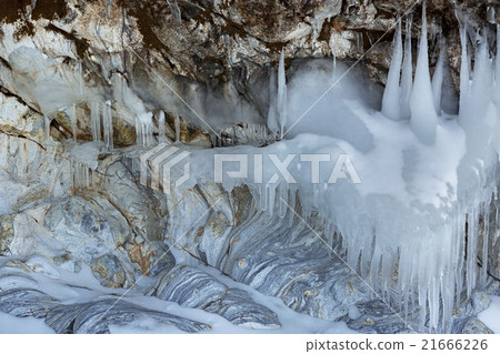 Beautiful icicles on rocks. Beautiful icicles on rocks. 21666226