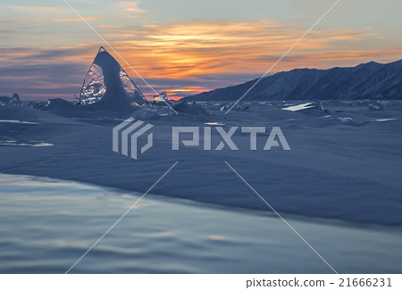 Transparent icicles at sunset. 21666231