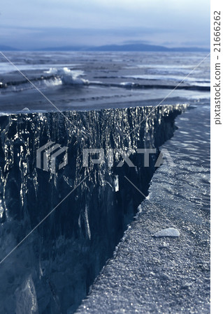 Large cracks on surface of the ice. Large cracks on surface of the ice. 21666262