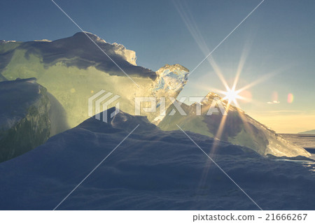 Sun rises over the ice floes. Sun rises over the ice floes. 21666267