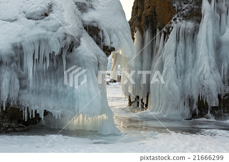 Beautiful icicles on rocks.  21666299