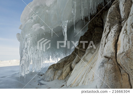 Beautiful icicles on rocks. Beautiful icicles on rocks. 21666304