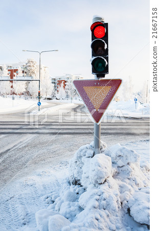 Red traffic light at winter Red traffic light at winter 21667158
