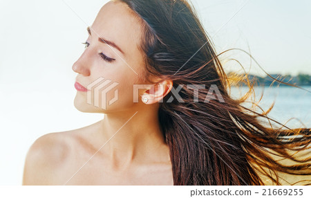 Free happy woman enjoying warm day. Beautiful Free happy woman enjoying warm day. Beautiful 21669255
