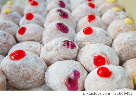 Delicious donuts with icing Delicious donuts with icing 21669492