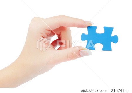 puzzle in hand isolated on white background 21674133
