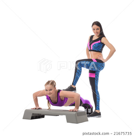Cute sporty girl helping her partner to train Cute sporty girl helping her partner to train 21675735