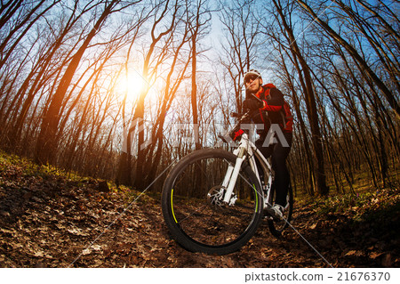 Cyclist Riding the Bike 21676370