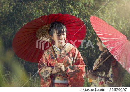 girls in kimonos acting smile girls in kimonos acting smile 21679097