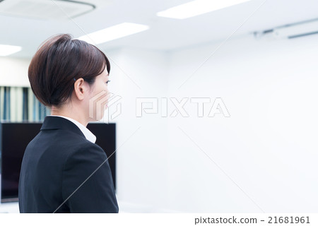 Rear of business woman entering conference room 21681961