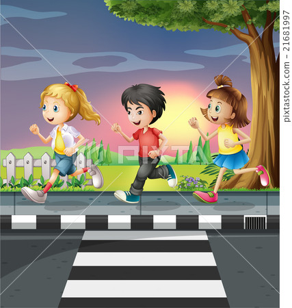 Three kids running along the road 21681997