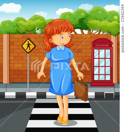 Woman crossing the road Woman crossing the road 21682264