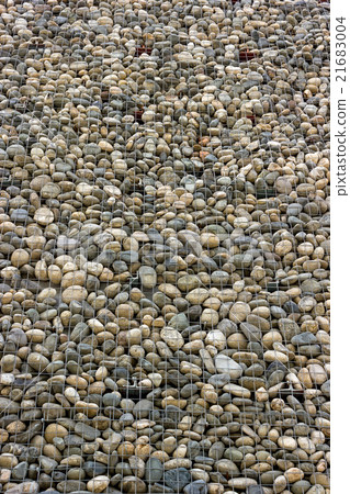 Backgrounds collection - Wall built of sea pebbles 21683004