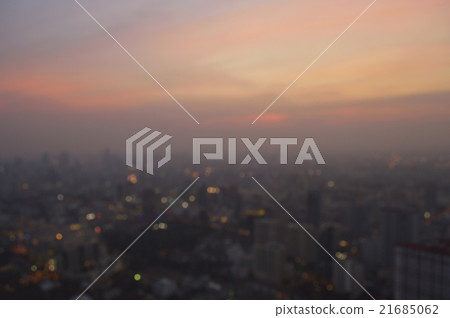 Blurred aerial view of cityscape on light sundown Blurred aerial view of cityscape on light sundown 21685062