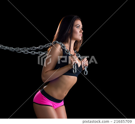 Body-building Nice girl exercising with chain Body-building Nice girl exercising with chain 21685709