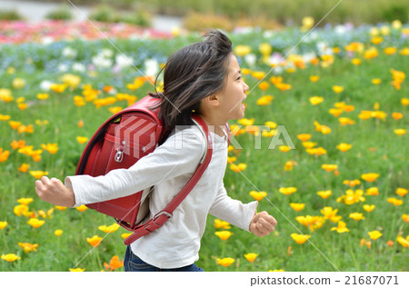 Girl running in flower garden (school bag) Girl running in flower garden (school bag) 21687071