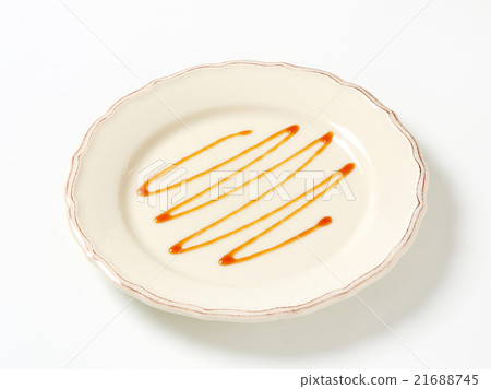 Caramel drizzle sauce 21688745