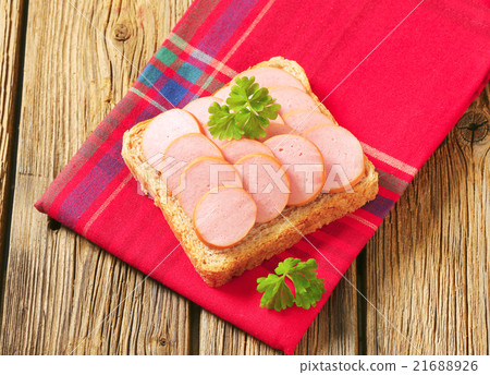 Whole wheat bread with sliced sausage Whole wheat bread with sliced sausage 21688926