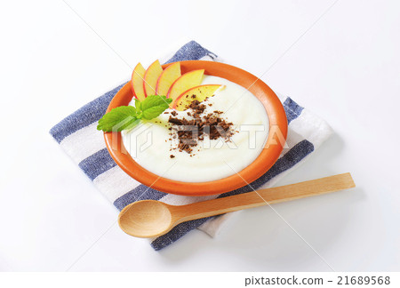 Semolina or rice pudding with apple and chocolate Semolina or rice pudding with apple and chocolate 21689568