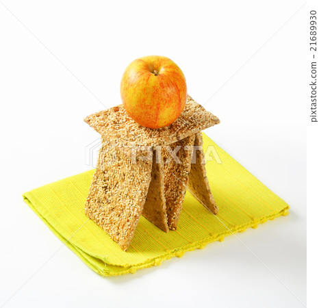 Sesame seed crackers and fresh apple Sesame seed crackers and fresh apple 21689930