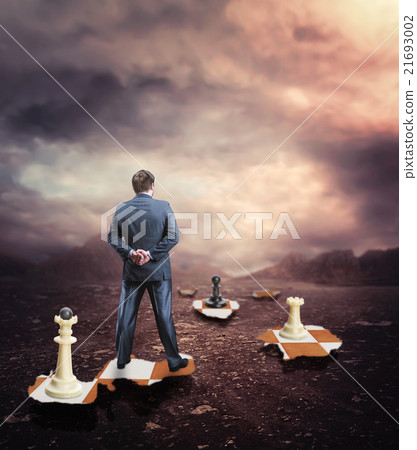 Businessman on the chess board 21693002