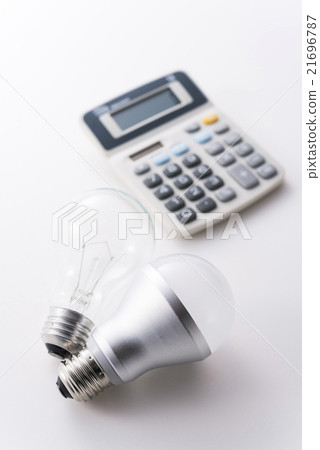 Incandescent light bulb and LED bulb and calculator Incandescent light bulb and LED bulb and calculator 21696787