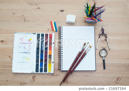 Workplace artist top view. Paint, brushes spread Workplace artist top view. Paint, brushes spread 21697384