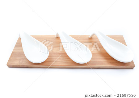 stone spoons on an wooden board stone spoons on an wooden board 21697550