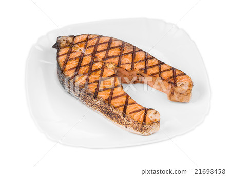 Fried salmon fillet on plate. 21698458
