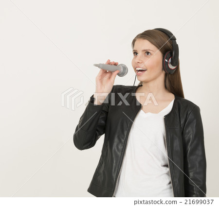 Young beautiful teenage girl singing Young beautiful teenage girl singing 21699037