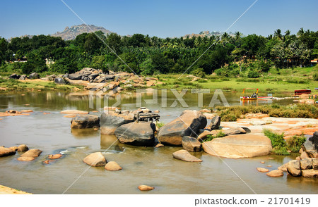 Crossing the Hampi's river, India 21701419