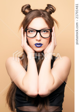 Beautiful young woman in glasses 21701481
