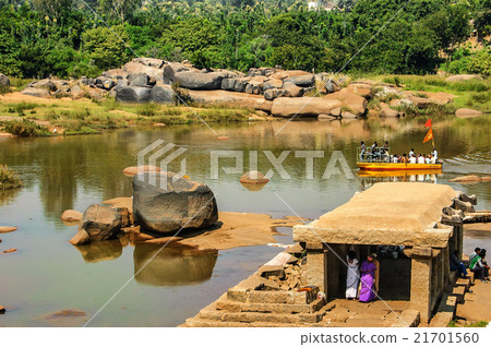 Crossing the Hampi's river, India 21701560