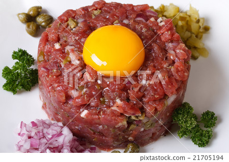Appetizing tartare beef closeup top view Appetizing tartare beef closeup top view 21705194