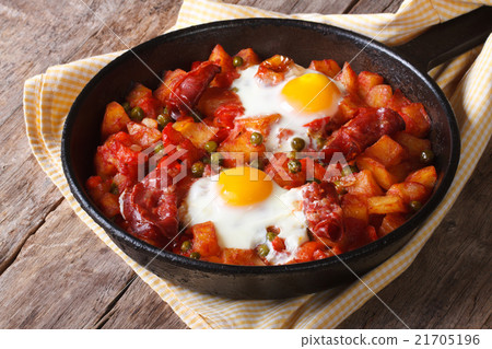Huevos a la flamenca, closeup. Horizontal Huevos a la flamenca, closeup. Horizontal 21705196