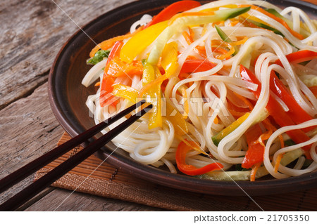 Rice noodles with peppers, carrots and zucchini Rice noodles with peppers, carrots and zucchini 21705350