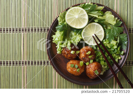 Traditional Asian fish balls with salad top view Traditional Asian fish balls with salad top view 21705520
