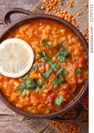Red lentil soup with lemon and fresh herbs 21705533