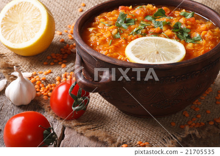 Red lentil soup with vegetables close-up 21705535