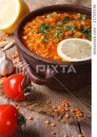Red lentil soup with vegetables close-up Vertical 21705536