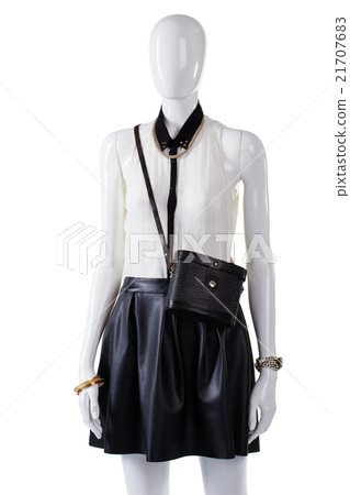 Mannequin wearing blouse with handbag. Mannequin wearing blouse with handbag. 21707683